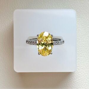 Yellow Oval Solitaire Halo Ring with Pavé Band